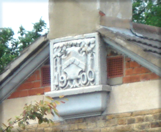 plaque on side of house
